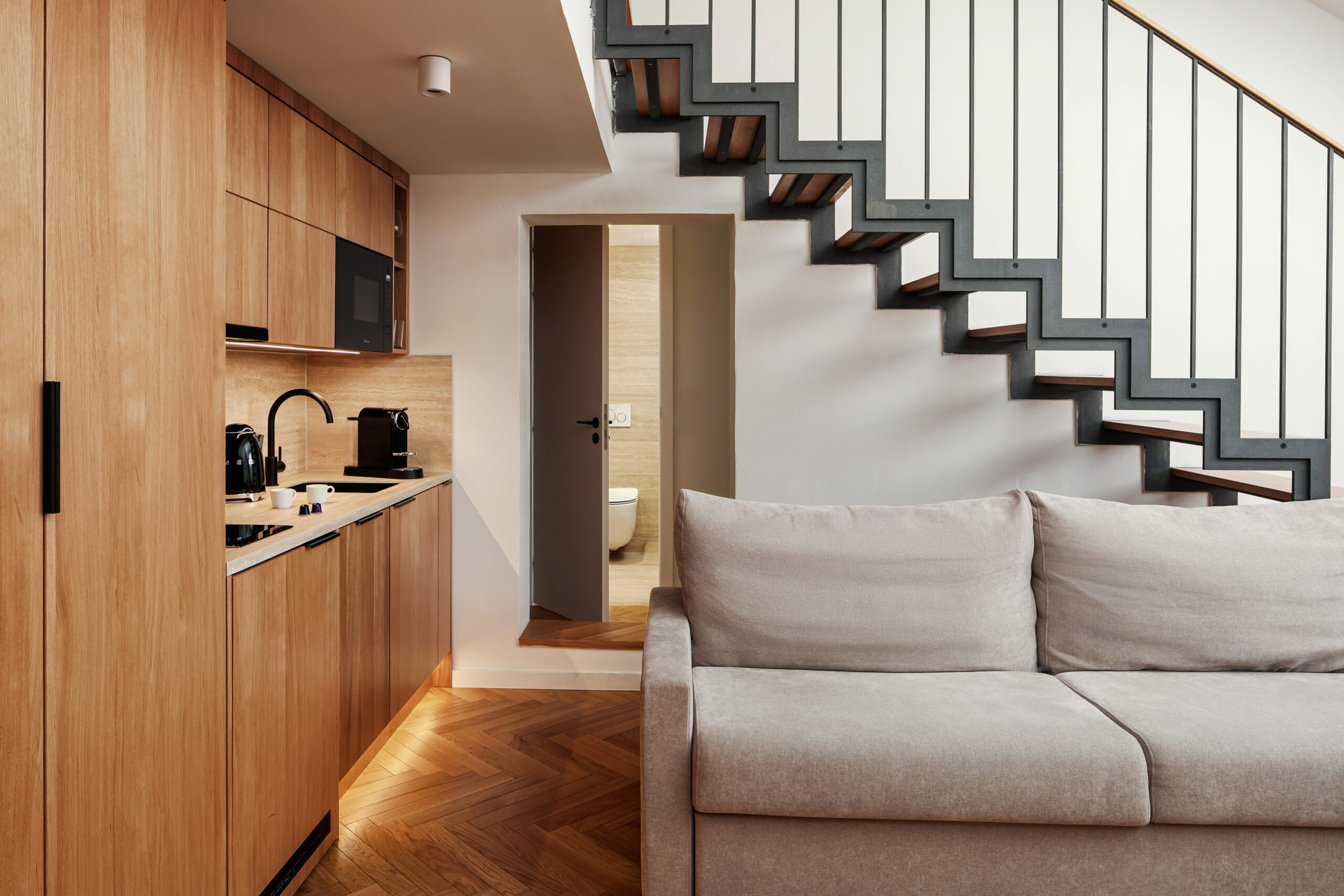 Open-plan living area in the Two-Bedroom Loft Apartment at Six Residences Prague